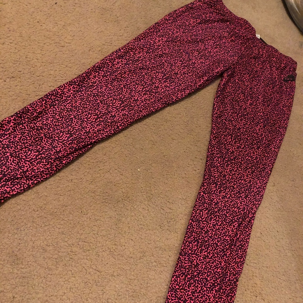 Nike pink cheetah print jogging pants
